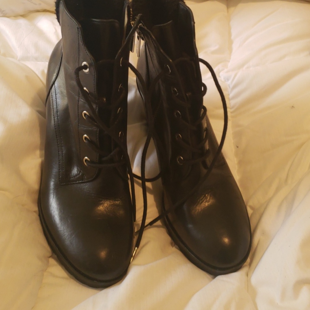 Black leather shoe boots